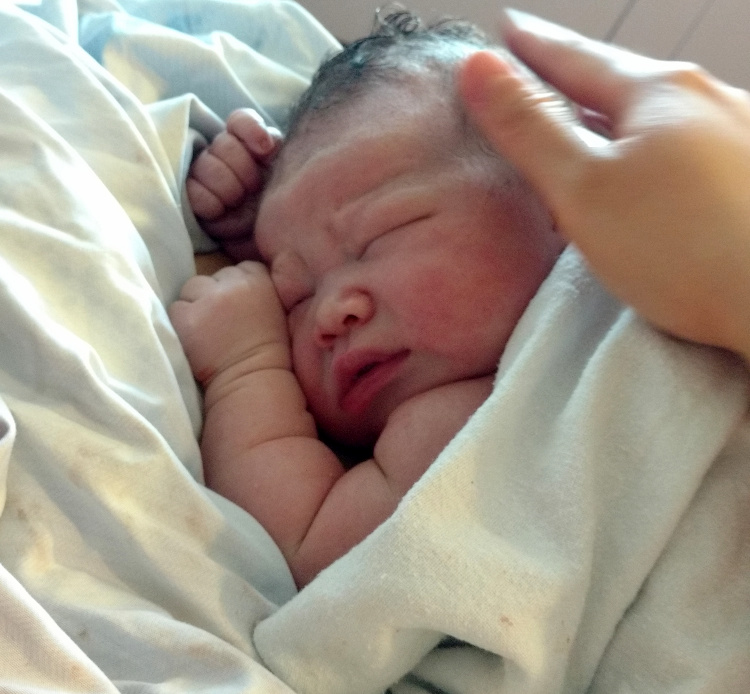 Detail photo of newborn Asta.