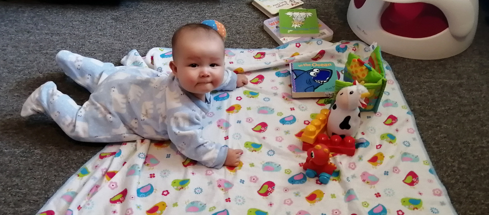 Baby playing on floor