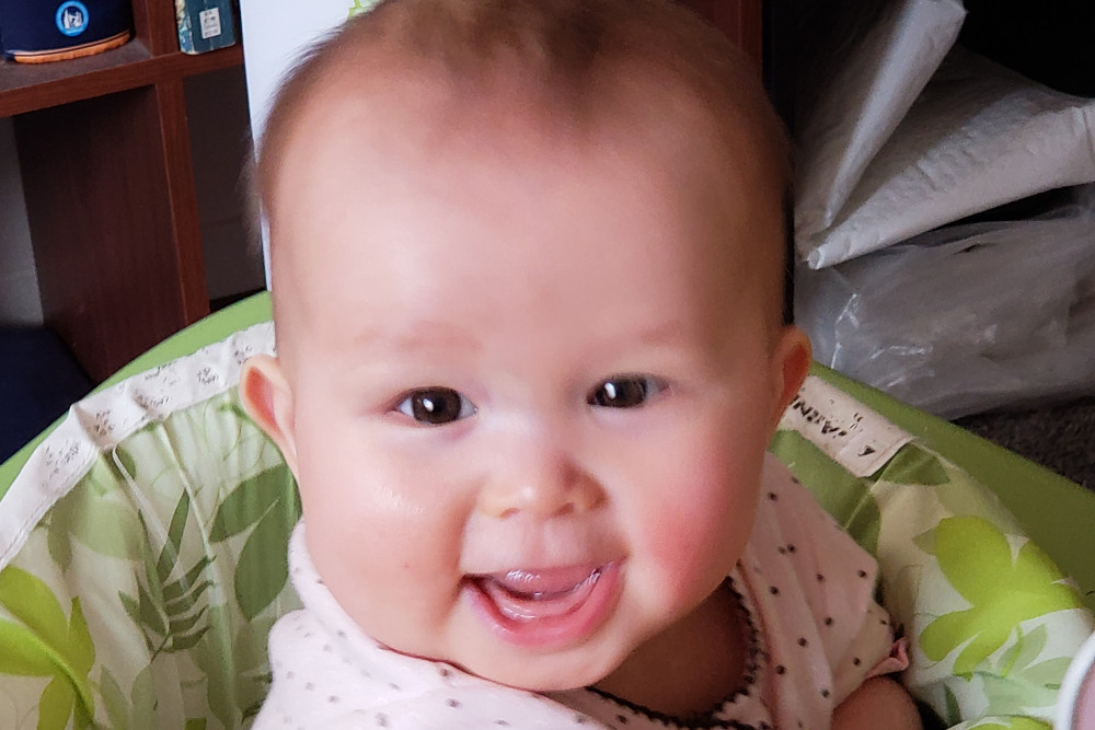 Photo of smiling baby.