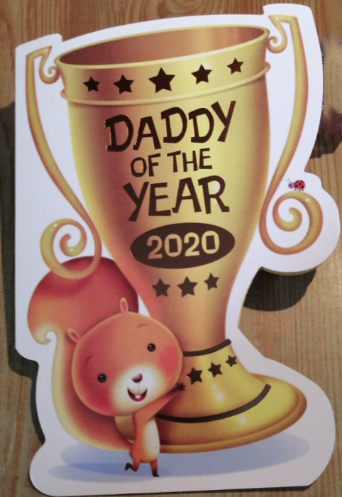 Photo of a Father's Day card cover reading Daddy of the Year 2020