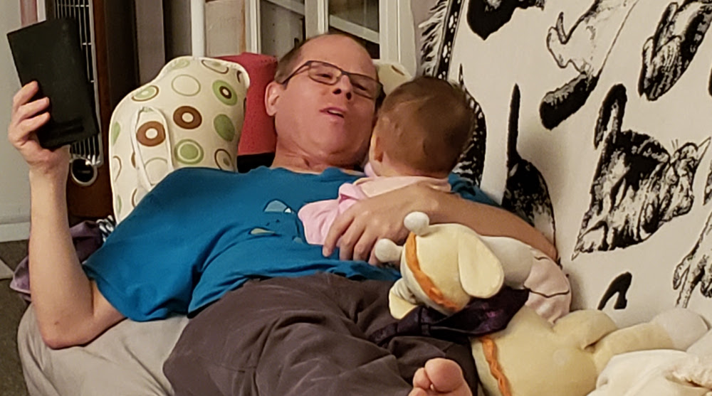 Papa Zesser and Baobao resting on couch